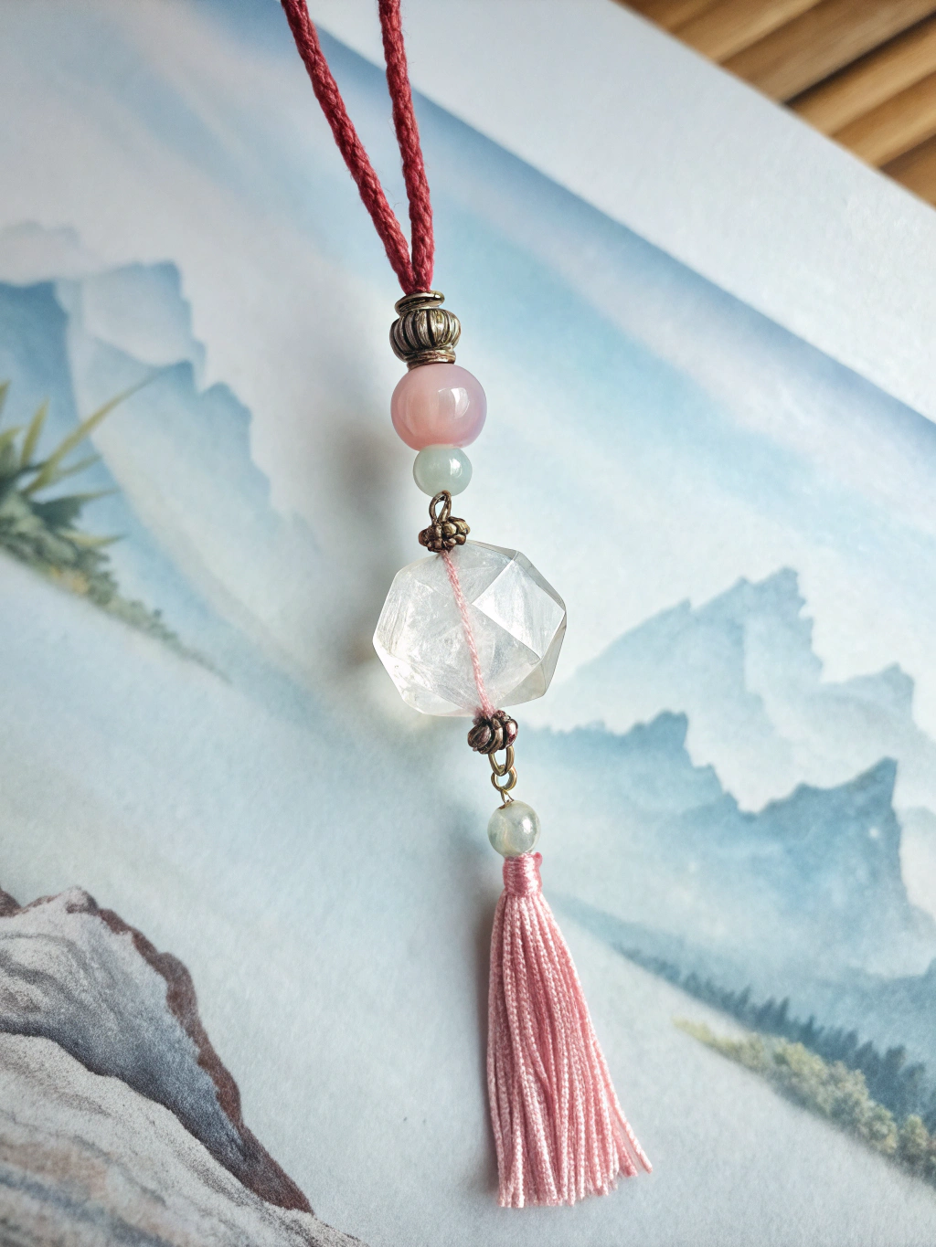 Hand-carved Guanyin pendant in translucent jadeite
